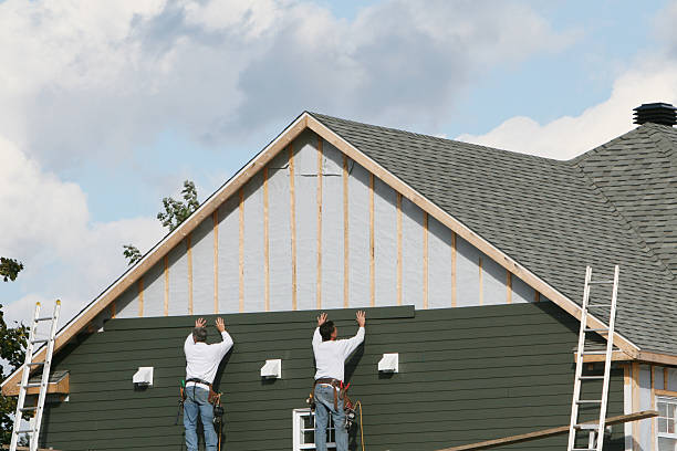 Professional Siding Installation technician working in Neshanic Station, NJ